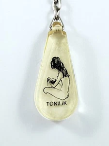 PORTE-CLES - TONILIK - Maman & Nourrisson - Résine, Vintage 1960s - - Picture 1 of 4