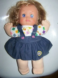 MUÑECA MÁGICA NIÑA PEQUEÑA MATTEL CABELLO RUBIO OSCURO OJOS MORADOS - Imagen 1 de 2