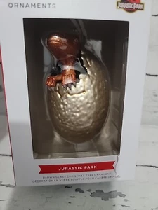 JURASSIC PARK Vidrio Soplado Bebé Dinosaurio Huevo Adorno de Navidad 2023 Sello - Imagen 1 de 4
