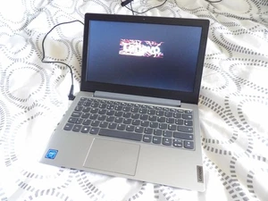 Portátil Lenovo IdeaPad 1 11IGL05 81VT 11.6" Celeron 64gb eMMC * CÁMARA WEB ROTA * - Imagen 1 de 4