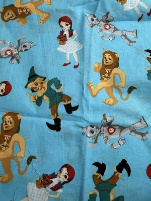 Wizard of Oz Fabric 1/2 Yard Dorothy Scarecrow Tin Man Lion Blue Cotton - Image 1 of 2