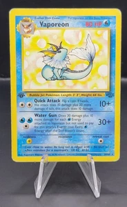 Pokemon Juego de Cartas Coleccionables Vaporeon 1ª Edición 28/64 Estrella Negra Raro Nonholo HP - Jungle - Imagen 1 de 3