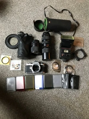 Camera Body. 2 x Lens. Camera Flash Unit. Plus Filters. - Image 1 of 4