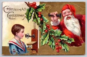 Niño en traje de marinero en teléfono de pared hablando con Santa Claus, postal de Navidad - Imagen 1 de 2