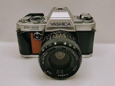 [Genial] Cámara SLR Yashica Fx-103 35 mm con lente de 28 mm funcionando Foto 1 de 4