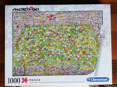 Puzzle Clementoni  1000 Pezzi Mordillo: Calcio - Immagine 1 di 4