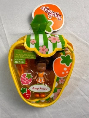 MUÑECA MONEDERO FRESA SHORTCAKE HASBRO TCFC FLOR DE AZAHAR Foto 1 de 2