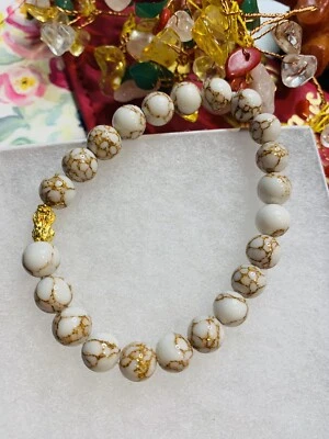 Natural 8MM 24K White Gold Howlite Spun Piyao - Image 1 of 4