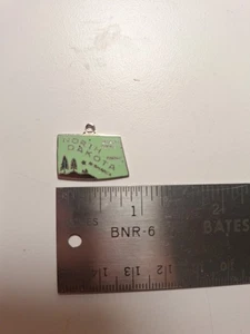North Dakota State Map Vintage Japan Silvertone Enamel Charm Pendant 3/4" - Picture 1 of 4