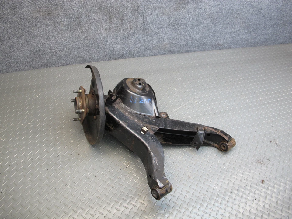 🥇84-85 NISSAN Z31 300ZX BRAZO TRASERO DERECHO HUSILLO NUDILLO RUEDA BUJE OEM Foto 1 de 4