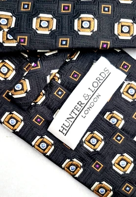Corbata de seda Hunter Lords London para hombre texturizada negra plata medallón hecha en Italia Foto 1 de 4