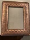 copper colored 8 x 10 picture frame in good condition