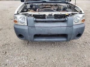 Used Front Bumper Assembly fits: 2004 Nissan Frontier textured without fog lamps
