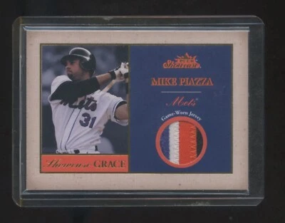 2004 FLEER SHOWCASE MIKE PIAZZA GAME WORN 4 COLOR JERSEY PATCH GOLD SP #ED 19/50 - Image 1 of 2