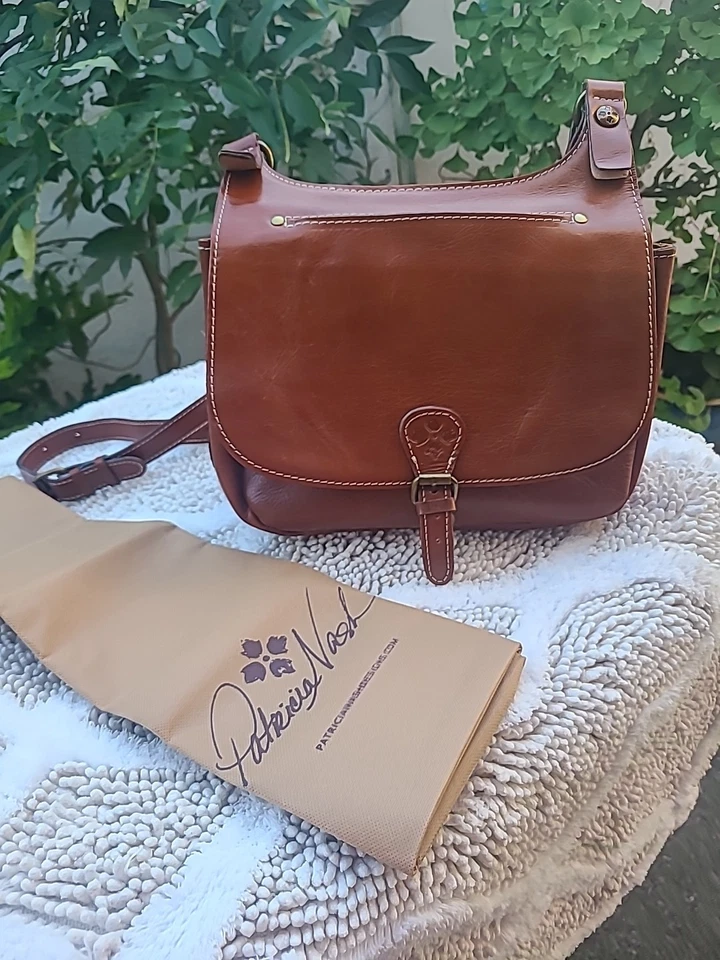 BOLSO DE SILLÍN PATRICIA NASH BANDOLERA CUERO LISO NUNCA USADO MARRÓN Foto 1 de 4