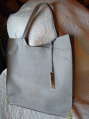 Bolso de Mano Antonio Melani Gris con Burbujas Blancas Acentos Dorados 14" W x 14" H x 4" D Foto 1 de 4
