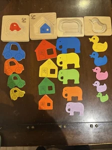 Hape Holzpuzzle Größe Sequenz A 4 Puzzles  - Bild 1 von 4