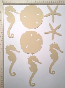 Sizzix Tim Holtz Sand & Meer 8 Papier Stanzformen Verzierungen Seepferdchen Seestern - Bild 1 von 4