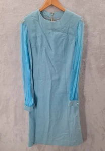 Abito vintage anni '70 blu a turni con maniche lunghe e trasparenti con bottoni - Foto 1 di 12