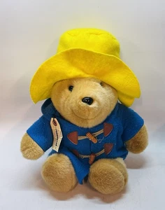 Vintage Eden Paddington Bär Plüsch mit Etikett blauer Mantel gelber Hut 10 Zoll mit Etikett - Bild 1 von 8