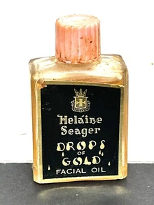 DE COLECCIÓN HELAINE SEAGER GOTA DE ACEITE FACIAL DORADO BOTELLA DE VIDRIO EN MINIATURA - Imagen 1 de 8