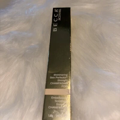 BECCA Jaclyn Hill Shimmering Skin Perfector Slimlight Highlighter -Champagne Pop - Image 1 of 3