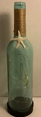 Декорированная бутылка с голубой подсветкой и волшебными огнями - Изображение 1 из 4