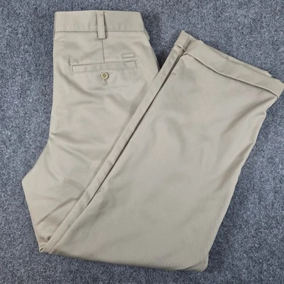 Pantalones chinos IZOD para hombre caqui calce clásico talla 32x30 plisados con puños Foto 1 de 4