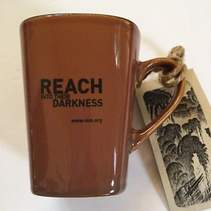 REACH INTO THEIR DARKNESS BROWN MUG NTM. ORG - Picture 1 of 9