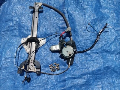 Power back cab glass window regulator from 2005 Nissan Titan - Image 1 of 4