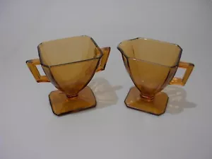 Set zuccheriera e cremiera vintage Art Decò con piedi in vetro ambrato 3,75" - Foto 1 di 5