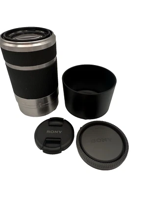 Lente zoom Sony E 55-210 mm F/4,5-6,3 OSS SEL55210 tapas para capucha montura E plateada Foto 1 de 4