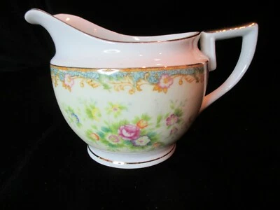 VINTAGE SAKURA CREAMER JAPAN MULTI COLORED FLOWERS  3 3/8" TALL - Image 1 of 4