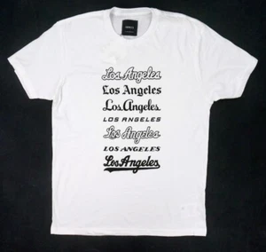 NUEVA CAMISETA PARA HOMBRE KNOWLITA BLANCA LOS ANGELES FUENTES GRÁFICAS S/S TALLA GRANDE - Imagen 1 de 2