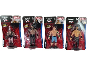 WWE FleXfigs Set Completo di 4 Cena Reigns Rollins Mysterio Mattel Nuovo HTF - Foto 1 di 11