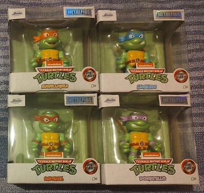 Juego de 4 llaveros Teenage Mutant Ninja Turtles Die Cast 2” Metalfigs 2023 nuevos en caja Foto 1 de 4