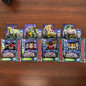 Hasbro Transformers Legacy Core Class Snarl, Slug, Sludge, and Scarr Set In Hand - Picture 1 of 5