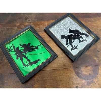 Par de siluetas de escena de invierno de cuadros de vidrio vintage pintados al revés Deltex  Foto 1 de 4