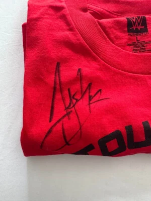 Autographed L WWE AJ Styles "The Untochable"T Shirt. NEVER WORN  - Image 1 of 2