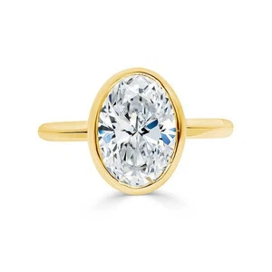 2Ct Oval Cut Moissanite Bezel Anniversary Women's Ring In Solid 14K Yellow Gold - Picture 1 of 6