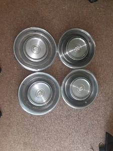 4 Used Cadillac Hubcaps  - Picture 1 of 11