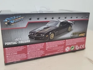 Pontiac Firebird 1977 Jada Toys Hollywood Rides, diecast, escala 1:32 negro - Imagen 1 de 5