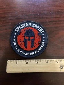 Spartan Sprint Race Patch Rosso Trifecta Ostacolo 4” Lo saprai all’arrivo Lin - Foto 1 di 4