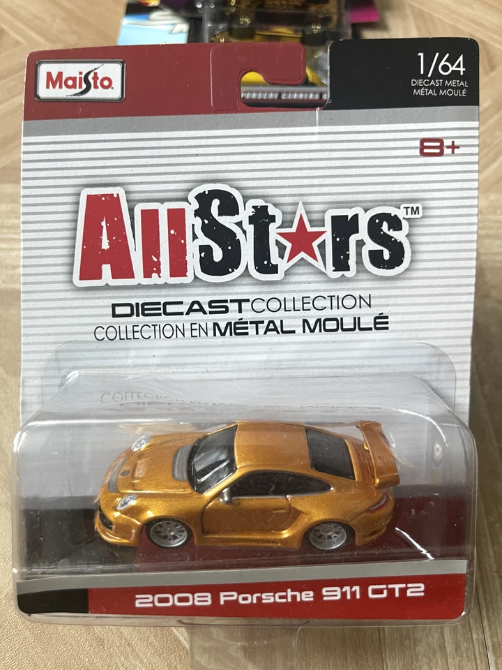 ¡Nuevo! ¡Sellado! Coche coleccionable detallado dorado Maisto 2008 Porsche 911 GT2 All Stars Foto 1 de 1