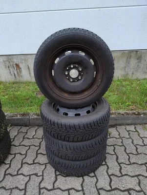4x Winterkompletträder Mini (F55 F56 F57) auf Original 15 Zoll Mini Stahlfelgen - Bild 1 von 4