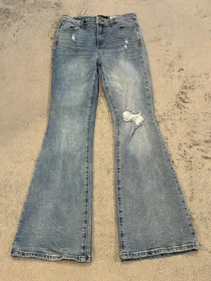 Pantalones de mezclilla azul elástico lavado claro acampanados tiro alto BCBGeneration para mujer 5/27 Foto 1 de 4