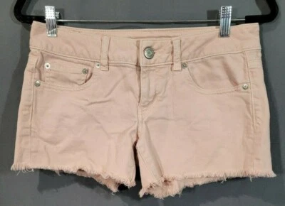 Pantalones cortos de jean American Eagle elásticos desgastados color melocotón para mujer talla 0 Foto 1 de 4