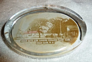 Pisapapeles Ocean Gate Ave Ocean Gate NJ mirando hacia el club náutico imagen de colección - Imagen 1 de 3