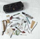Antique Doctor Bag with Vintage Medical Instruments and Supplies