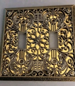 Placa de pared de metal fundido de filigrana doble palanca Amerelle, latón antiguo CAJA ABIERTA - Imagen 1 de 2